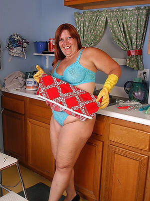 fat mature housewife doing laundry